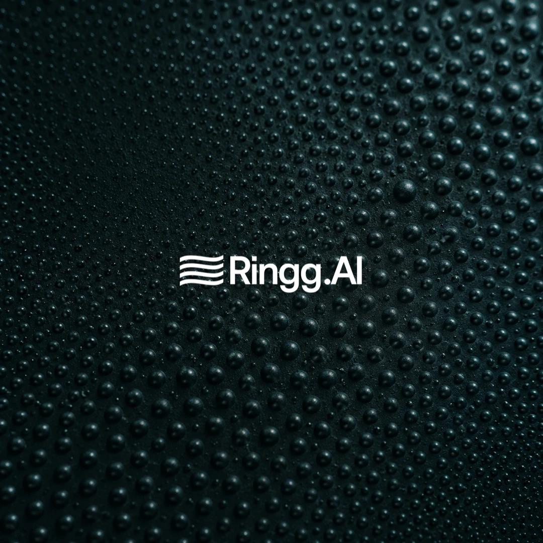 Dark raised-dot macro texture with the white Ringg.AI wordmark.